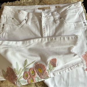 White jeans, mid rise, with embroidery on sides
